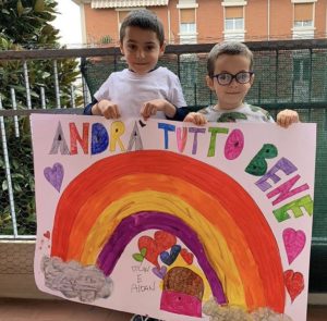 The children of Italy are making posters to hang on their balconies and in their gardens: "Everything will be okay." 