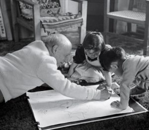 Pablo Picasso with his children Paloma and Claude at Villa la Galloise, in Vallauris, France, 1953.