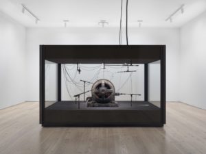 A view of a landscape: A cotton gin motor, (2012–2018) Cotton gin motor, microphones, soundproofing and audio hardware by Kevin Beasley (b.1985) 