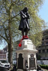 Statue of Edward Colston, Bristol, UK, 1895 Stone and bronze by John Cassidy (1860-1939) Yarn-bombed in 2018. Toppled and thrown into Bristol Harbour, June 7, 2020. Retrieved by Bristol City Council, June 11, 2020, with plans to exhibit in a museum without removing the graffiti and ropes. 