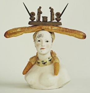 Retrospective Bust of a Woman 1933 (some elements reconstructed 1970) Painted porcelain, bread, corn, feathers, paint on paper, beads, ink stand, sand, and two pens 29 x 27 1/4 x 12 5/8 inches by Salvador Dalí (1904-1989)