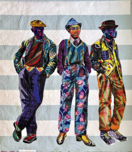 The Mighty Gents, 2018 Quilted and appliquéd cotton, wool and chiffon 78 × 67 inches by Bisa Butler